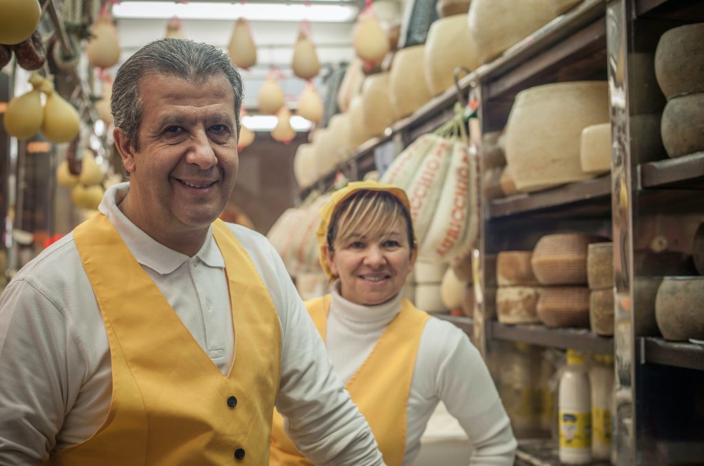 Man and woman in cheese shop