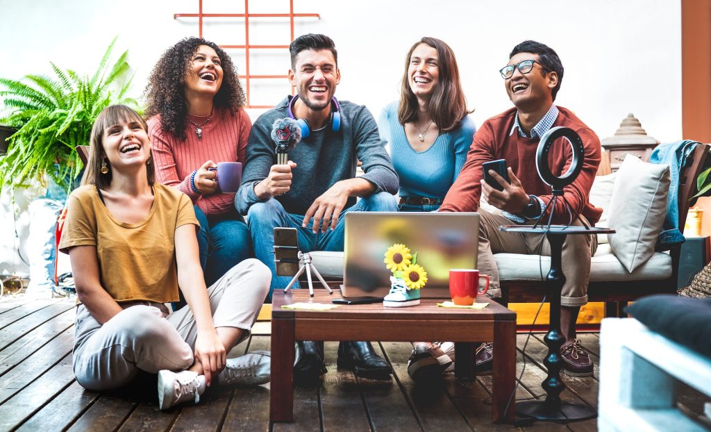 Trendy friends startupper having fun on streaming platform online