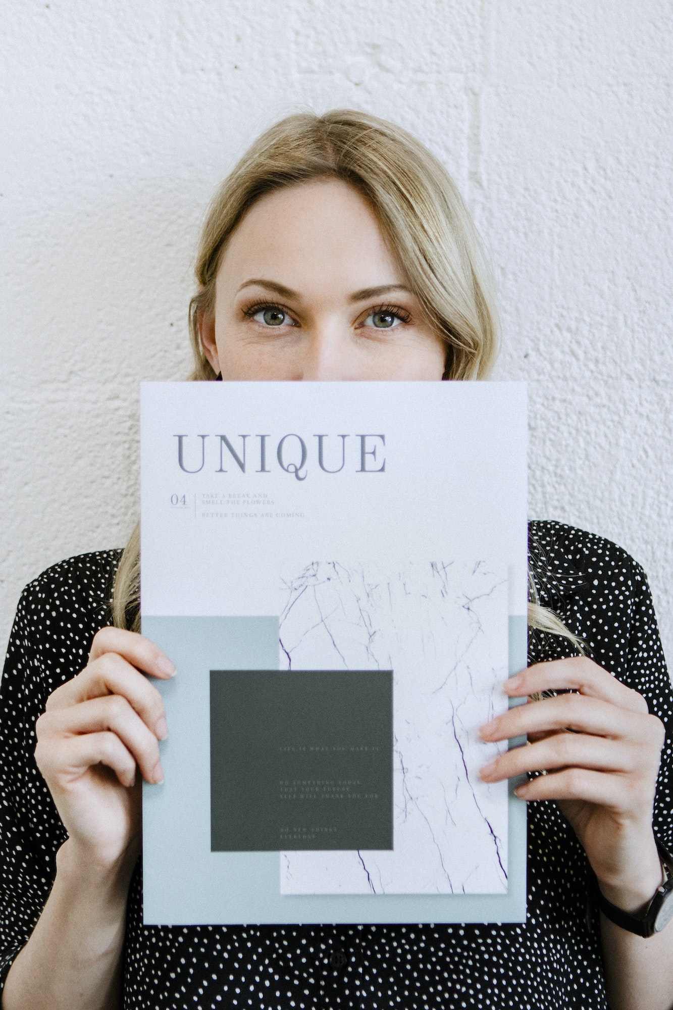 Woman holding a magazine